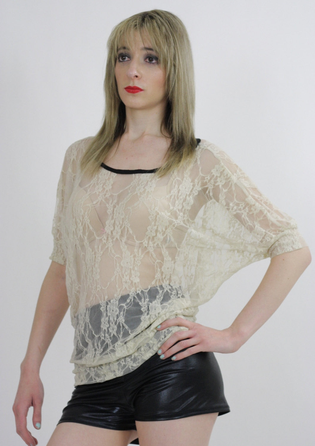 cream blouse with black trim